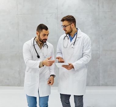 Portrait of a group of doctors and health care workers in the office hospital