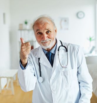 portrait of a senior doctor in a hospital