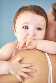 The age of innocence. a mother carrying her adorable baby girl