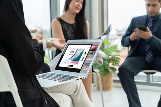 Graphic designer software for modern design of web page and commercial ads showing on the computer screen