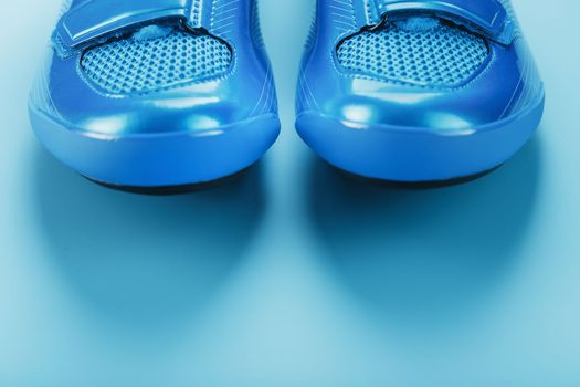 Blue highway cycling ROAD shoes on a blue background