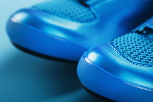 Blue highway cycling ROAD shoes on a blue background