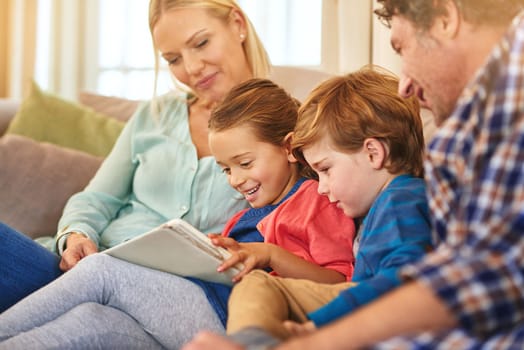 Theyre a family that reads together. a family spending quality time together at home