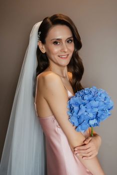 morning wedding celebration with wedding dress and veil clothes