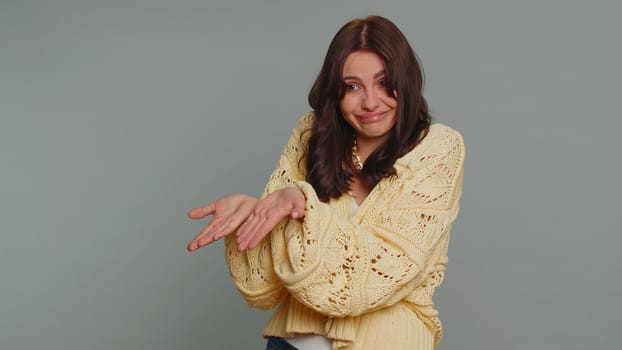 Woman raising hands asking what why reason of failure, demonstrating disbelief irritation by troubles trendy social media meme anti lifehacks ridicules people who complicate simple tasks for no reason