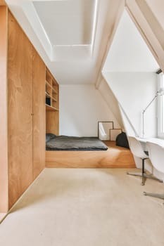 a bedroom with a bed, desk and shelves on the wall next to an open closet in a room that has been used for