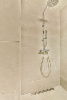 a shower that is clean and ready to be used for the bathroom reurrecturing in your home