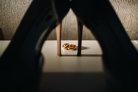 Close-up of two gold wedding rings for a wedding.