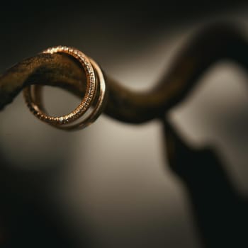 Close-up of two gold wedding rings for a wedding.