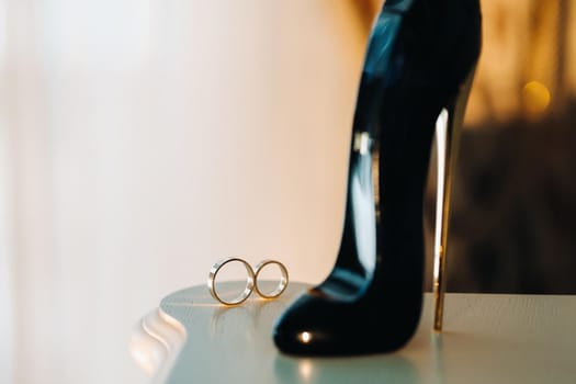 Close-up of two gold wedding rings for a wedding.