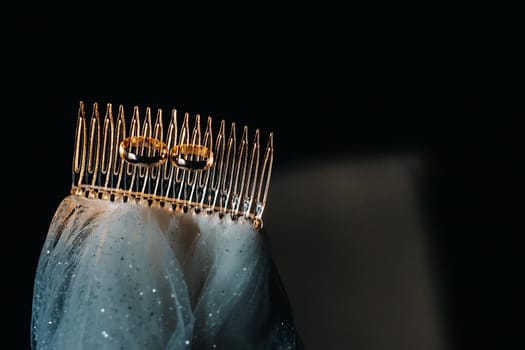 Close-up of two gold wedding rings for a wedding.