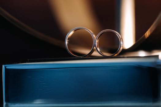 Close-up of two gold wedding rings for a wedding.