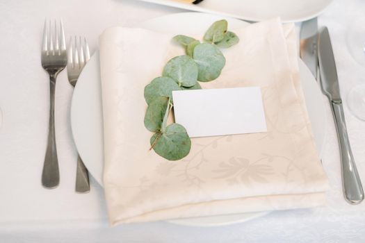 Dishes on the wedding table, decor of the dining table for the holiday.