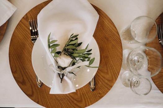 Dishes on the wedding table, decor of the dining table for the holiday.