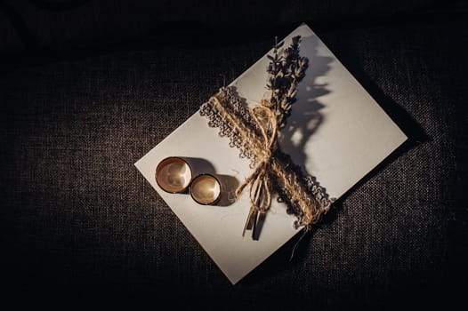 Close-up of two gold wedding rings for a wedding.