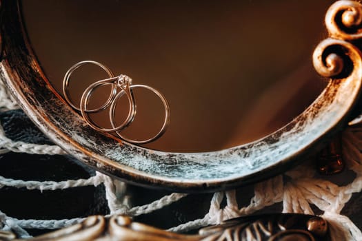 Close-up of two wedding gold rings engagement ring.Three rings.Wedding ring.Wedding.