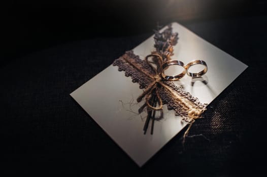 Close-up of two gold wedding rings for a wedding.