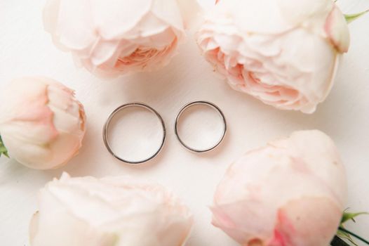 Close-up of two gold wedding rings for a wedding.