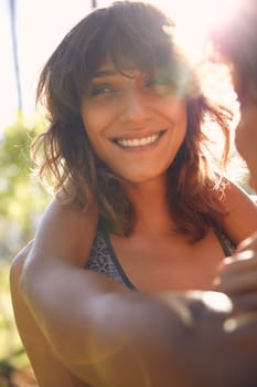 Feeling all kinds of happy. a young couple spending the day outdoors on a sunny day