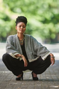 When your femininity has swag. Portrait of an attractive young woman posing outdoors