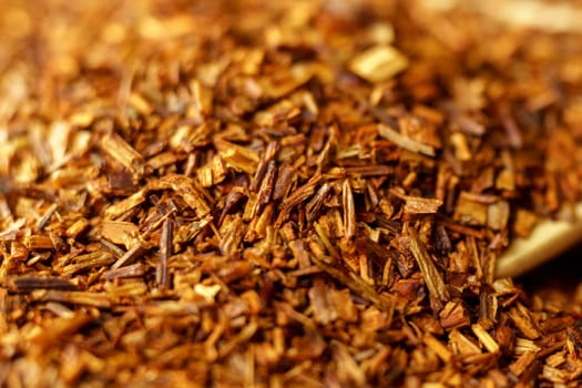 Rooibos close-up, Macro of redbush tea close-up. Leaving South Africa. Selective focus
