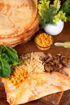 pancakes with mushrooms, cheese and corn