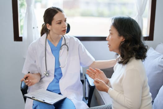 Portrait of a female doctor holding clipboard documents to discuss and analyze the patient's condition before treating