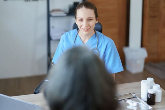 Portrait of a female doctor holding tablet computer to discuss and analyze the patient's condition before treating