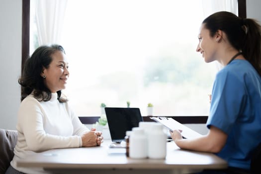 Portrait of a female doctor holding a patient clipboard to discuss and analyze the patient's condition before treating