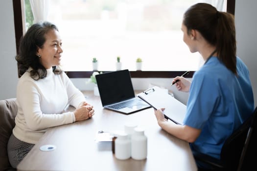 Portrait of a female doctor holding a patient clipboard to discuss and analyze the patient's condition before treating