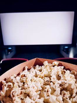 Cinema and entertainment, popcorn box in the movie theatre for tv show streaming service and film industry production branding