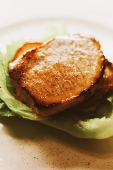 Food and diet, fried pork fillet with lettuce as meal for lunch or dinner, tasty recipe idea