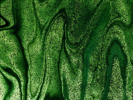 The texture of green liquid marble. Green shiny background with natural texture