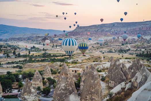 Colorful hot air balloon flying over Cappadocia, Turkey.