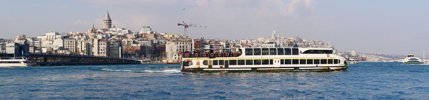 Istanbul cityscape, ferries and bridge.