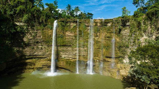A tropical Niludhan waterfall in the jungles. Negros, Philippines.
