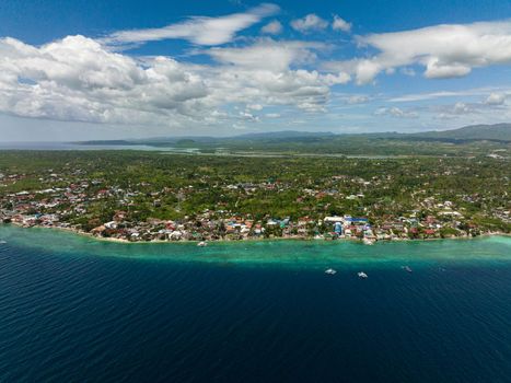 Coastline with coral reef and blue water, diving site, Moalboal, Philippines.Cebu.