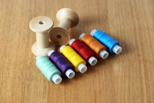 Diversity sewing set on old wooden background