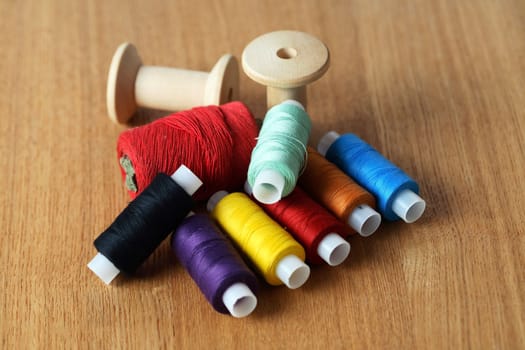 Diversity sewing set on old wooden background