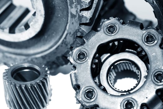 Engineering concept. Extreme closeup of set of old gears