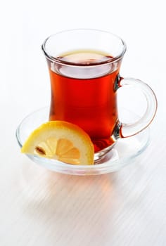 Nice small cup of Turkish black tea with lemon