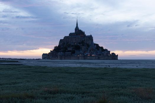 Panoramic view of famous historic Le Mont Saint-Michel in summer, Normandy, northern France. High quality photo