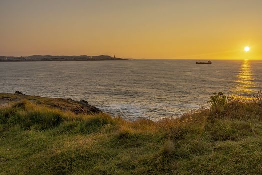 A Coruna sunset with the Atlantic ocean in the background. Photo from Seixo Branco, Oleiros, Galicia. High quality photo