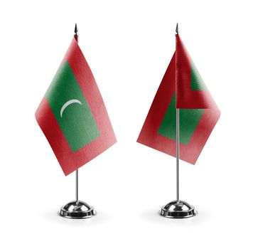 Small national flags of the Maldives on a white background.