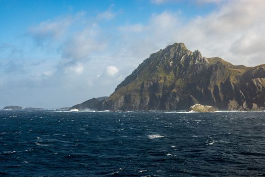 Rocky cliffs form Cape Horn on Hornos Island in Chile
