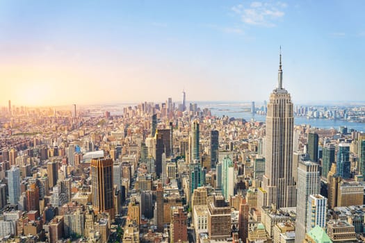 Amazing panorama view of New York city skyline and skyscraper at sunset. Beautiful cityscape in Midtown Manhattan. Copy space for text.