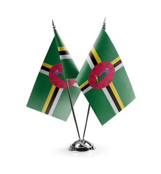 Small national flags of the Dominica on a white background.