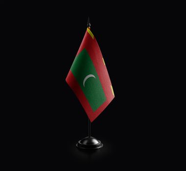 Small national flag of the Maldives on a black background.