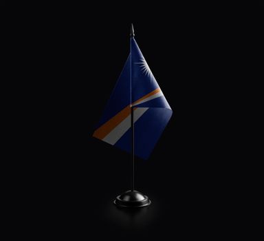 Small national flag of the Marshall on a black background.