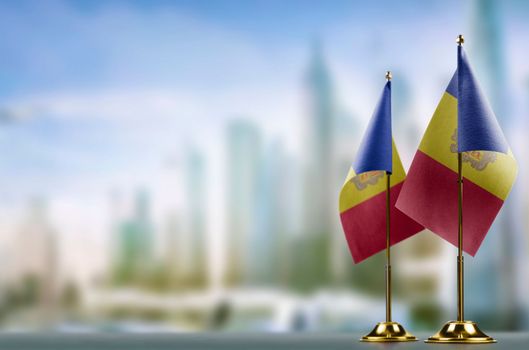 A small Andorra flag on an abstract blurry background.